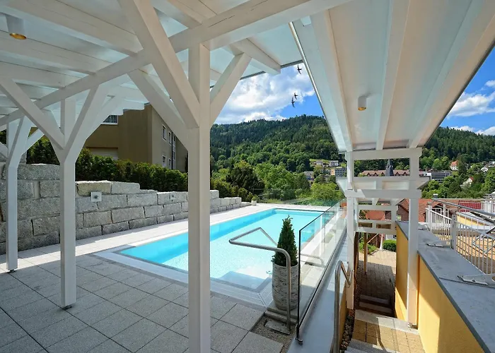 Wellnesshotel Rothfuss Mit Und 2 Schwimmbaedern מלון באד ווילבאד