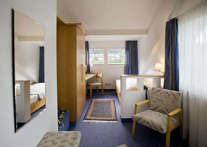 Wellnesshotel Rothfuss Mit Und 2 Schwimmbaedern מלון באד ווילבאד